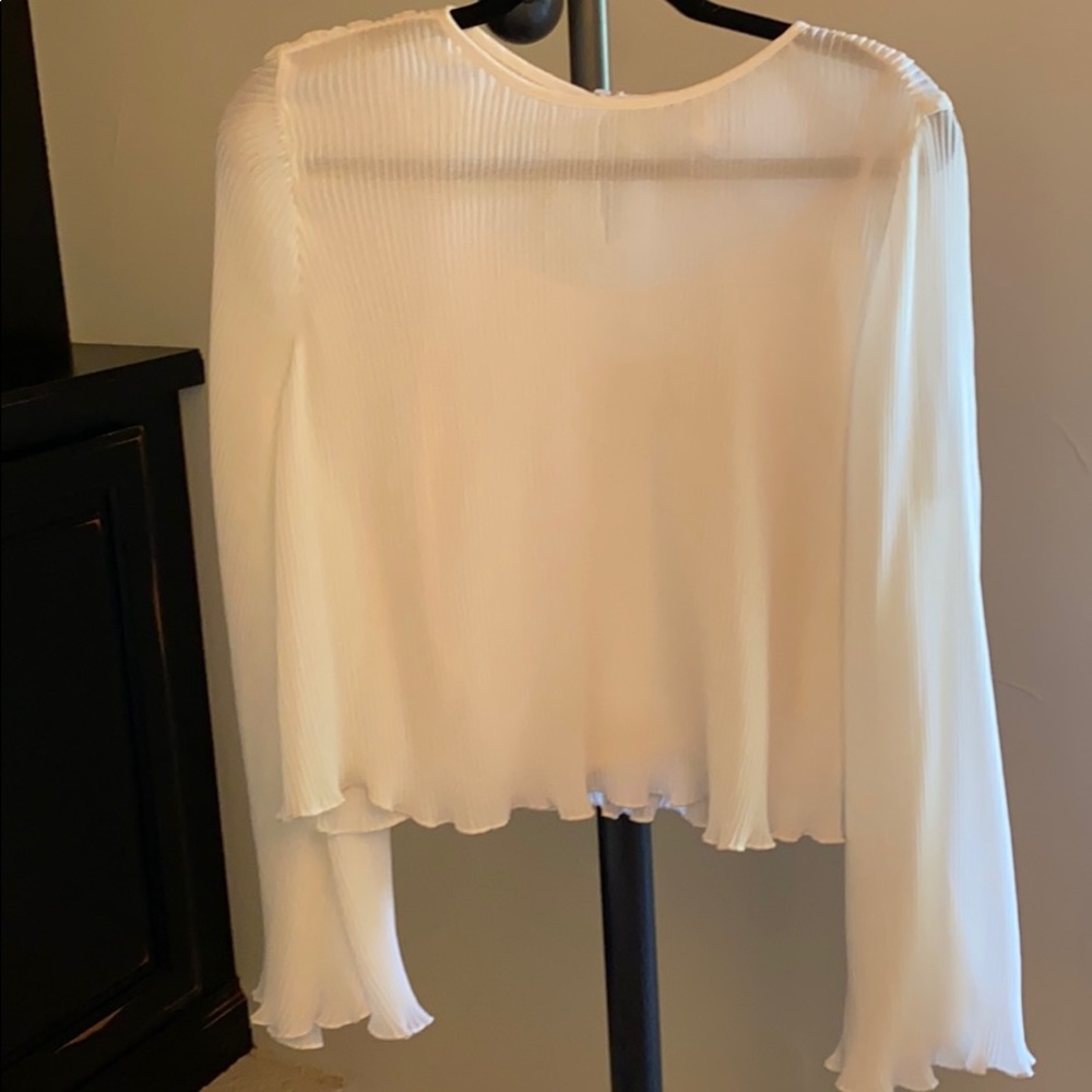 Fine pleated cream blouse